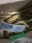 Nieuwe remschoenen Mazda 121(bolhoedje)